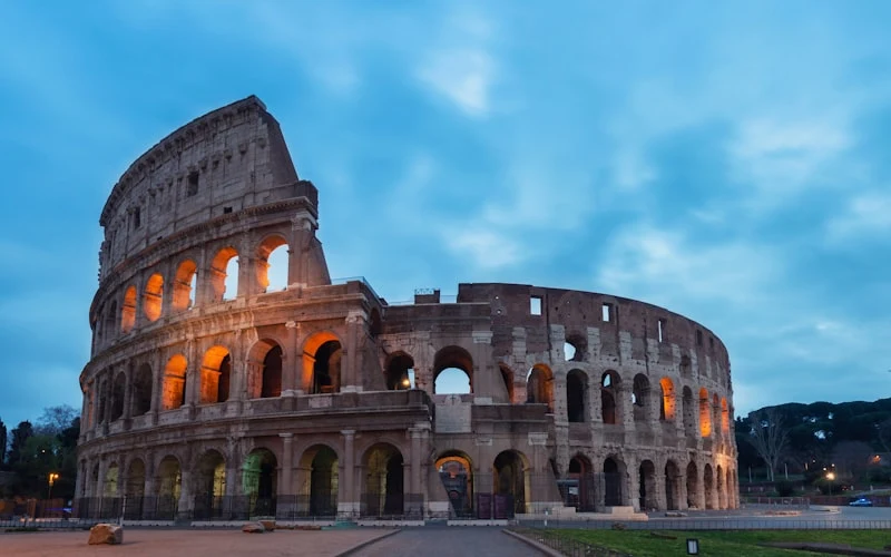 The Colosseum in Rome lit up at dusk